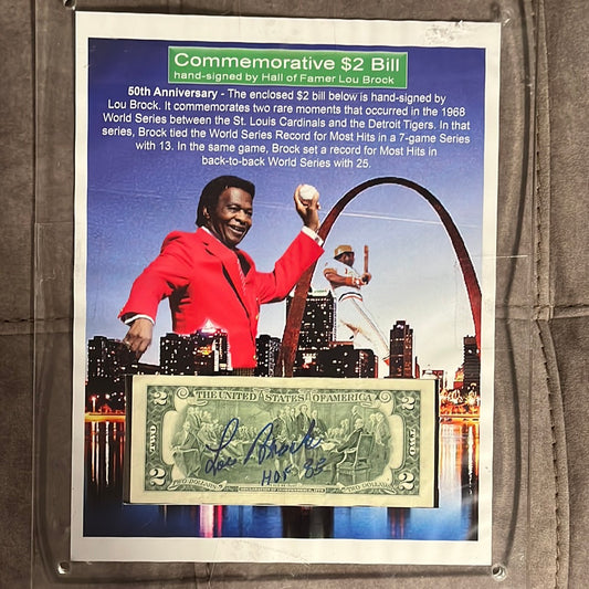 Commemorative two dollar bill signed by Lou Brock