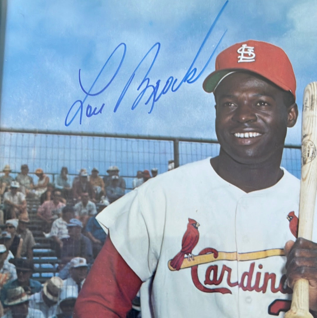 8 x 10 is photo signed by Lou Brock