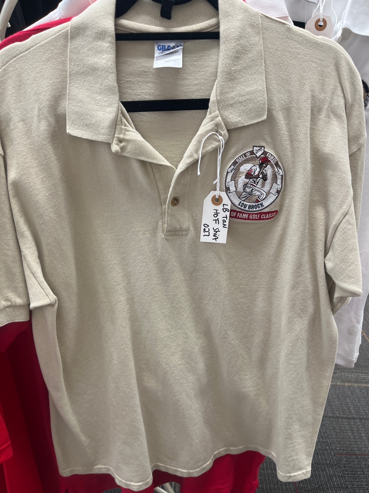 Lou Brock’s tan Lou Brock Hall of Fame golf classic shirt size