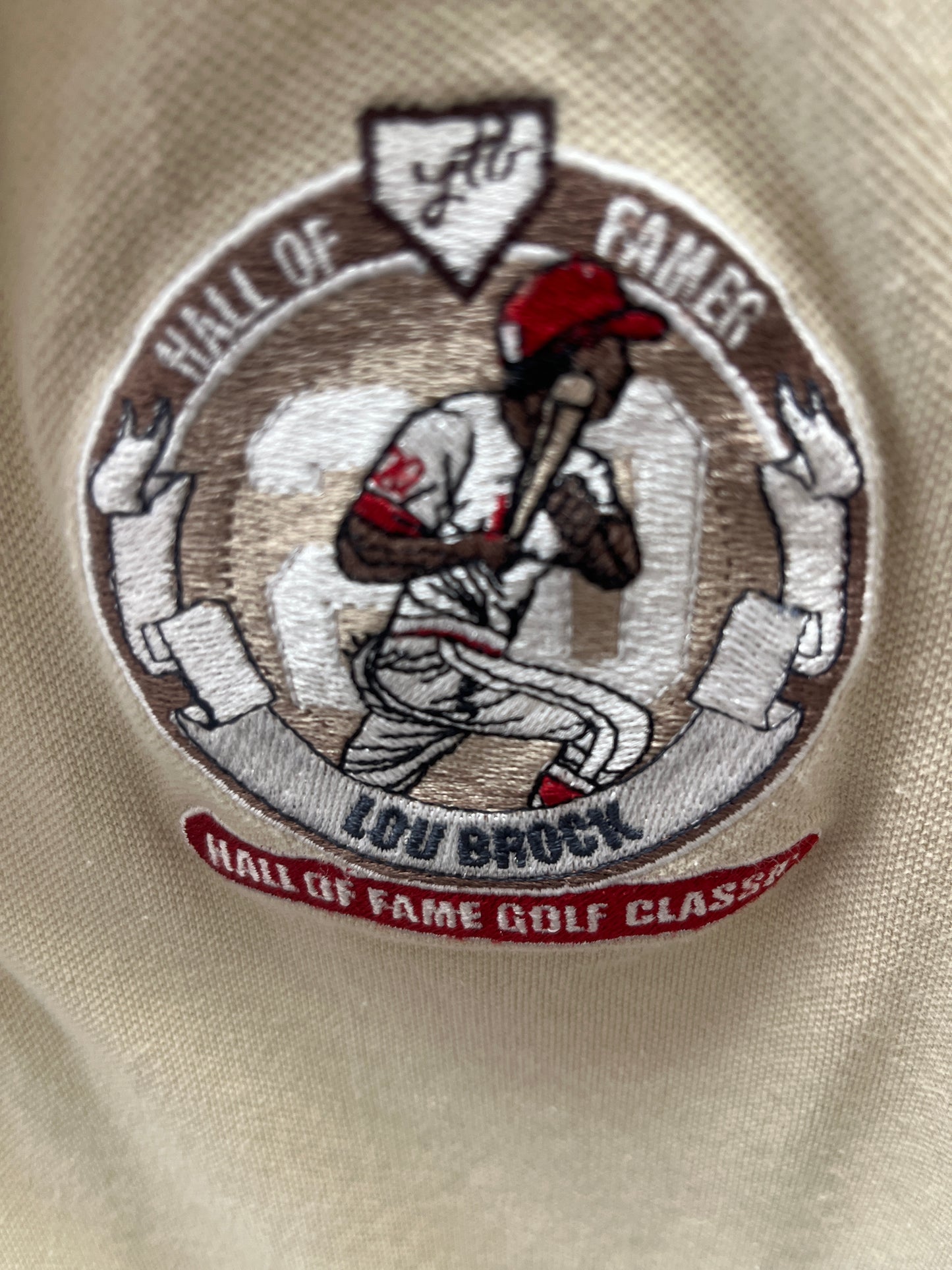 Lou Brock’s tan Lou Brock Hall of Fame golf classic shirt size