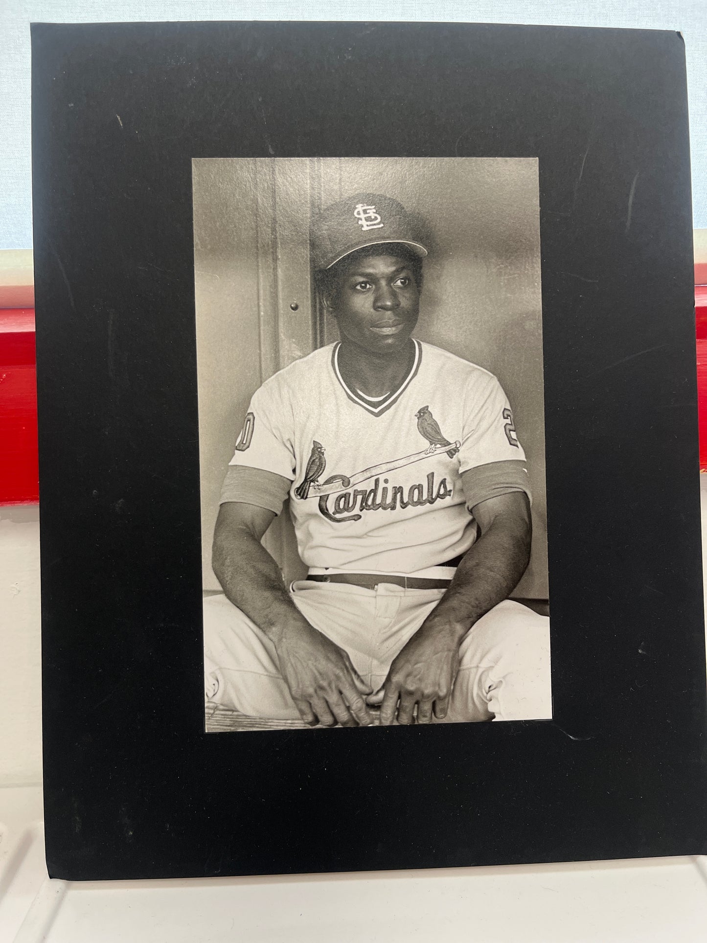 11 x 14 matted black-and-white picture of Lou Brock