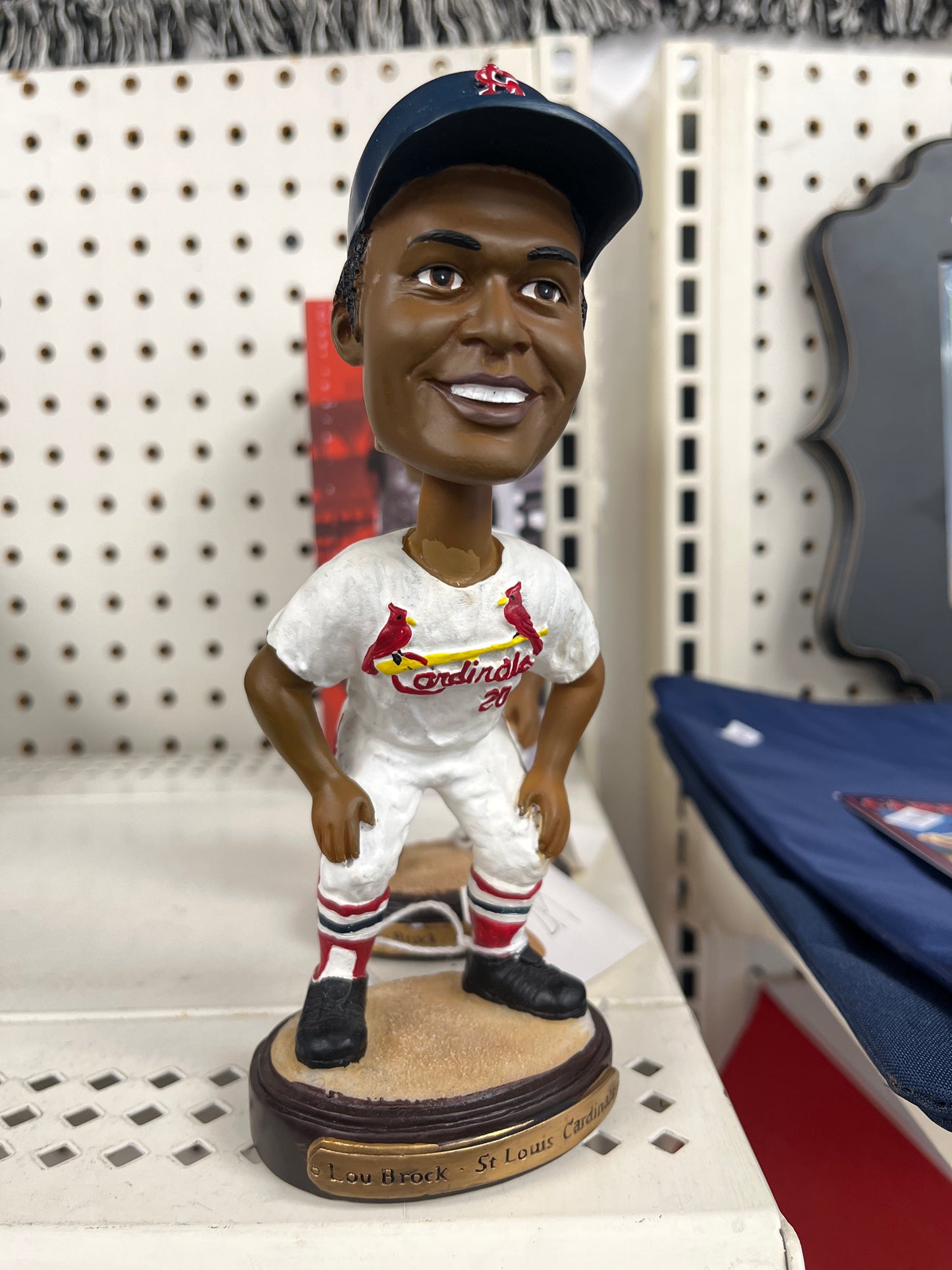 Lou Brock Lindenwood university bobble head and Lindenwood hat